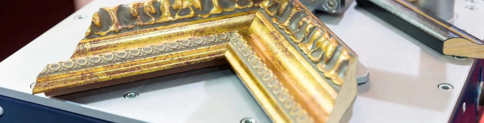 Moulding held in a mitre clamp on the joining bench